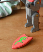 Red Ostheimer black knight shield with green dragon. 