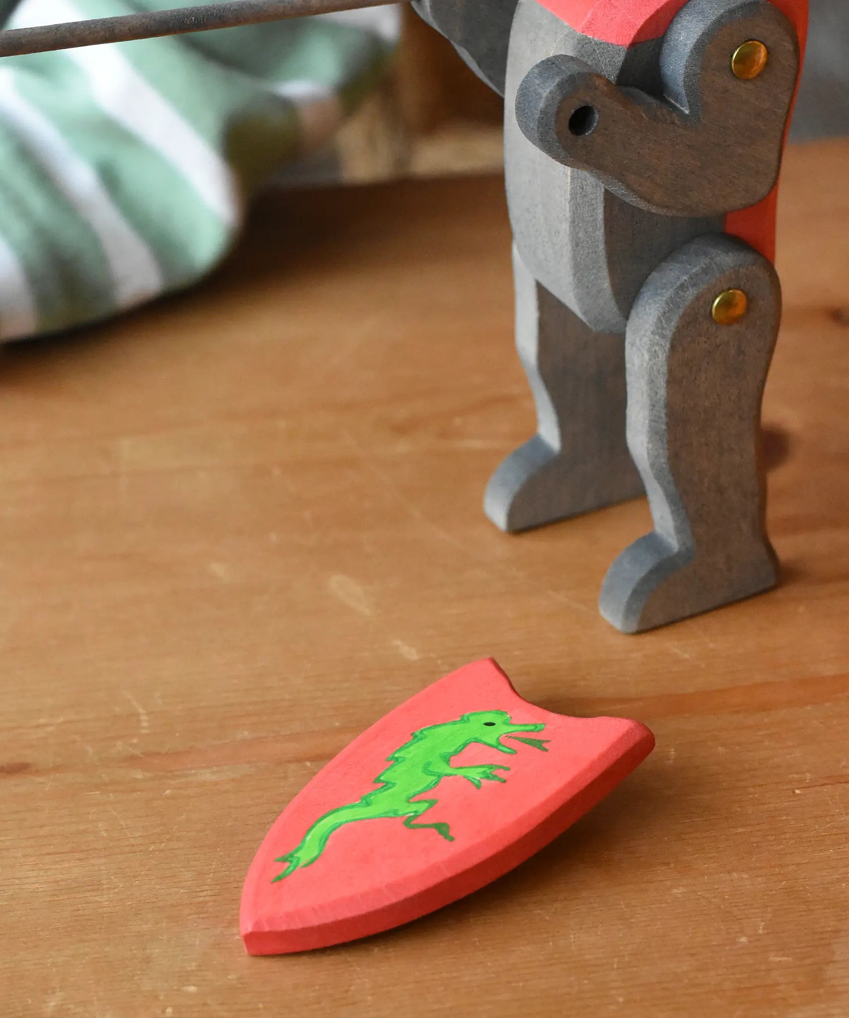 Red Ostheimer black knight shield with green dragon. 