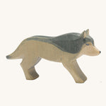 Ostheimer wooden running wolf on a plain background. 