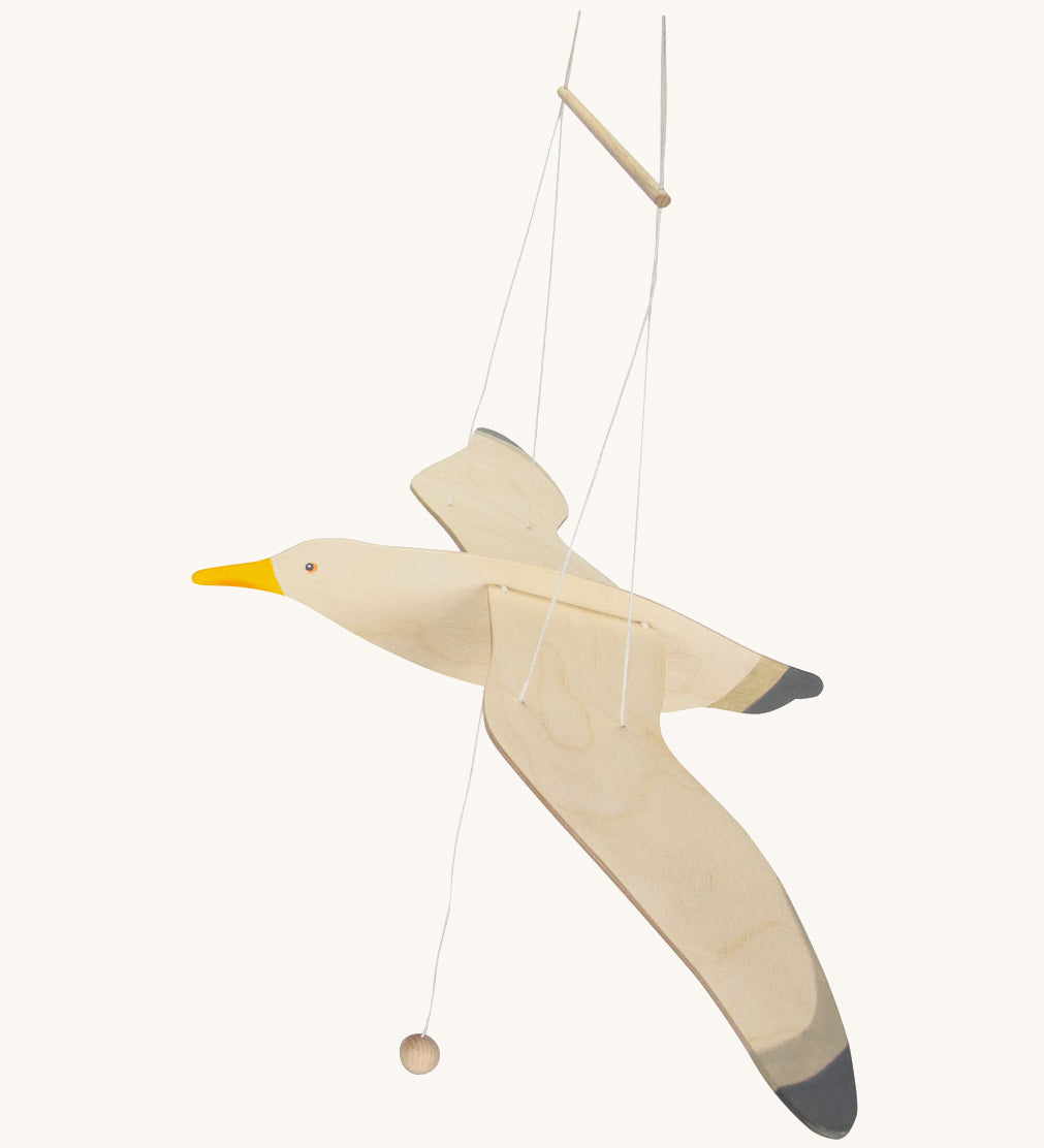 Ostheimer wooden seagull mobile showing it's wings spread out with the string holding the mobile
