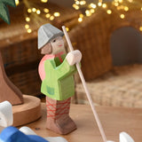 Ostheimer shepherd wooden toy nativity figure in a small world play scene. 