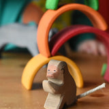 Ostheimer sitting baboon wooden toy figure, close up of the front.