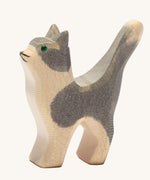 Ostheimer Small Cat toy figure with it's Head held High on a plain background.
