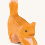 Ostheimer Small Cat toy figure with it's Head Low on a plain background. 
