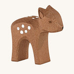 Ostheimer small deer wooden toy figure on a plain background. 