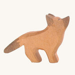 Ostheimer Small German Shepherd with it's head held upwards on a plain background.