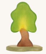 Ostheimer Small Oak Tree & Support wooden toy figures on a plain background. 