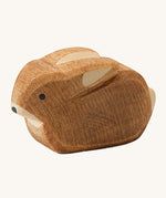 Ostheimer small rabbit wooden oy figure on a plain background. 