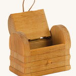 Ostheimer toy Treasure Chest on a plain background. The lid of the chest can be seen open.