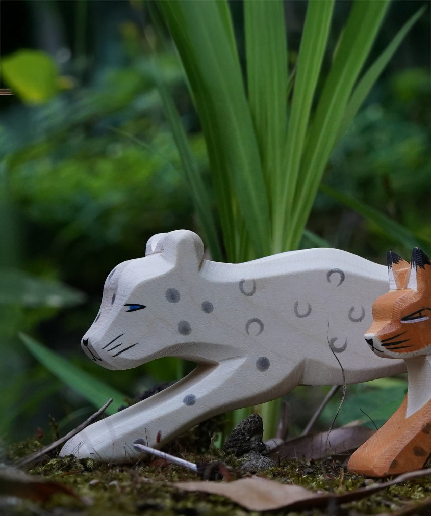 Ostheimer Wooden Snow Leopard figure. This expertly hand crafted wooden figure is part of a large range of wooden toys here at Babipur.