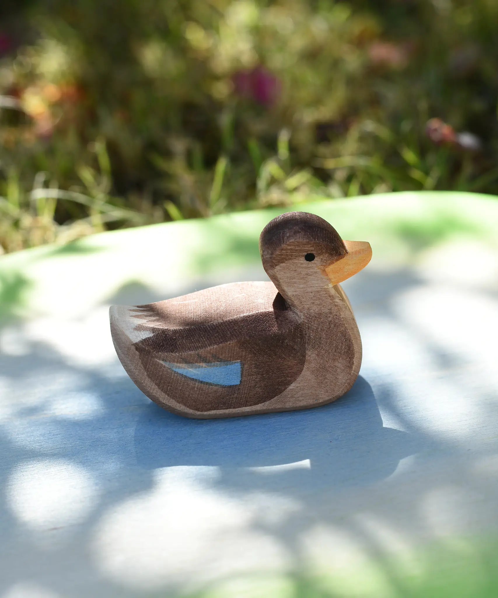Ostheimer swimming duck placed on a pond piece.