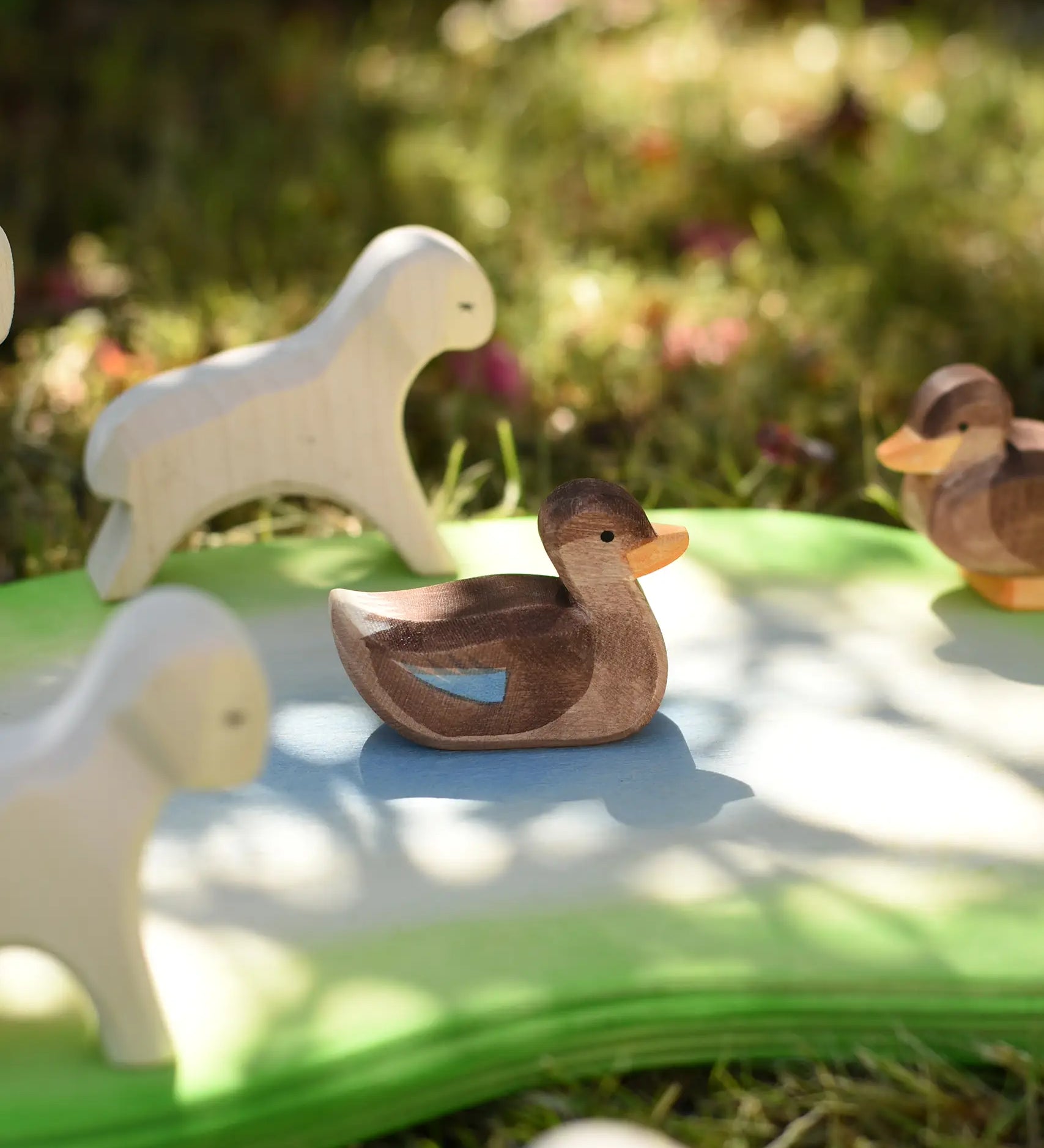 Ostheimer swimming duck placed in a small wold play scene in the Babipur garden. 