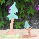 An Ostheimer tall spruce tree pictured next to the fir tree for dwarves. 