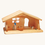 Ostheimer dolls house wooden toy on a plain background. The house has Ostheimer figures inside which are available seperatley 