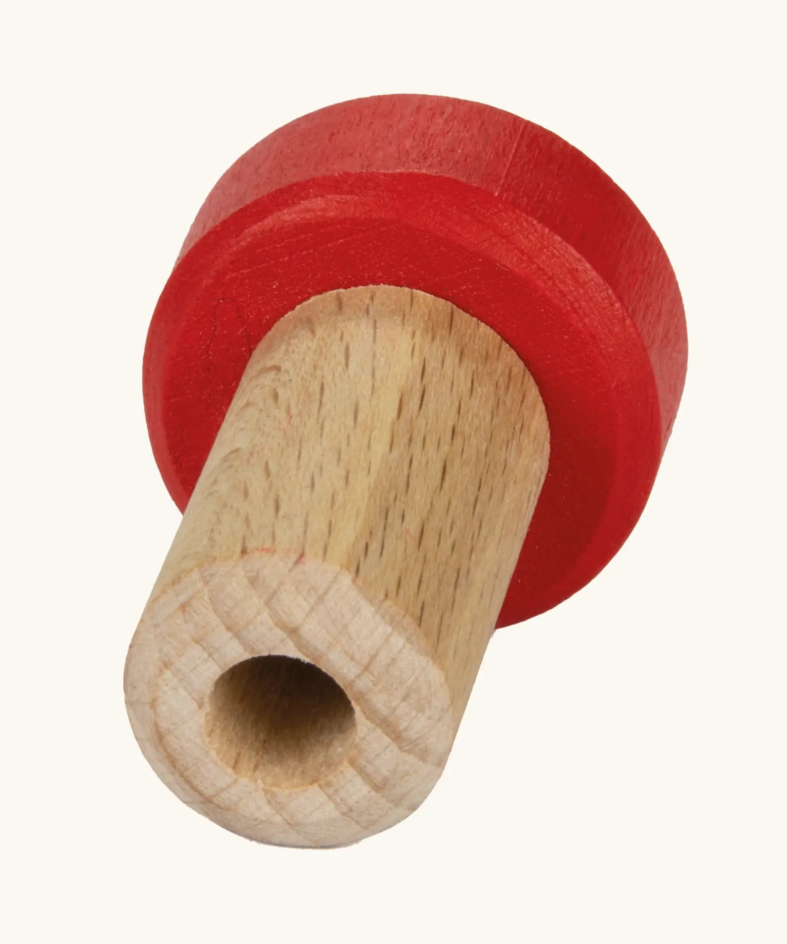 Ostheimer handcrafted wooden trailer adapters with a unpainted pin and red top.