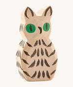 Ostheimer white wooden owl figure on a plain background. 