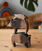 Stack of Ostheimer wild boar wooden figures.