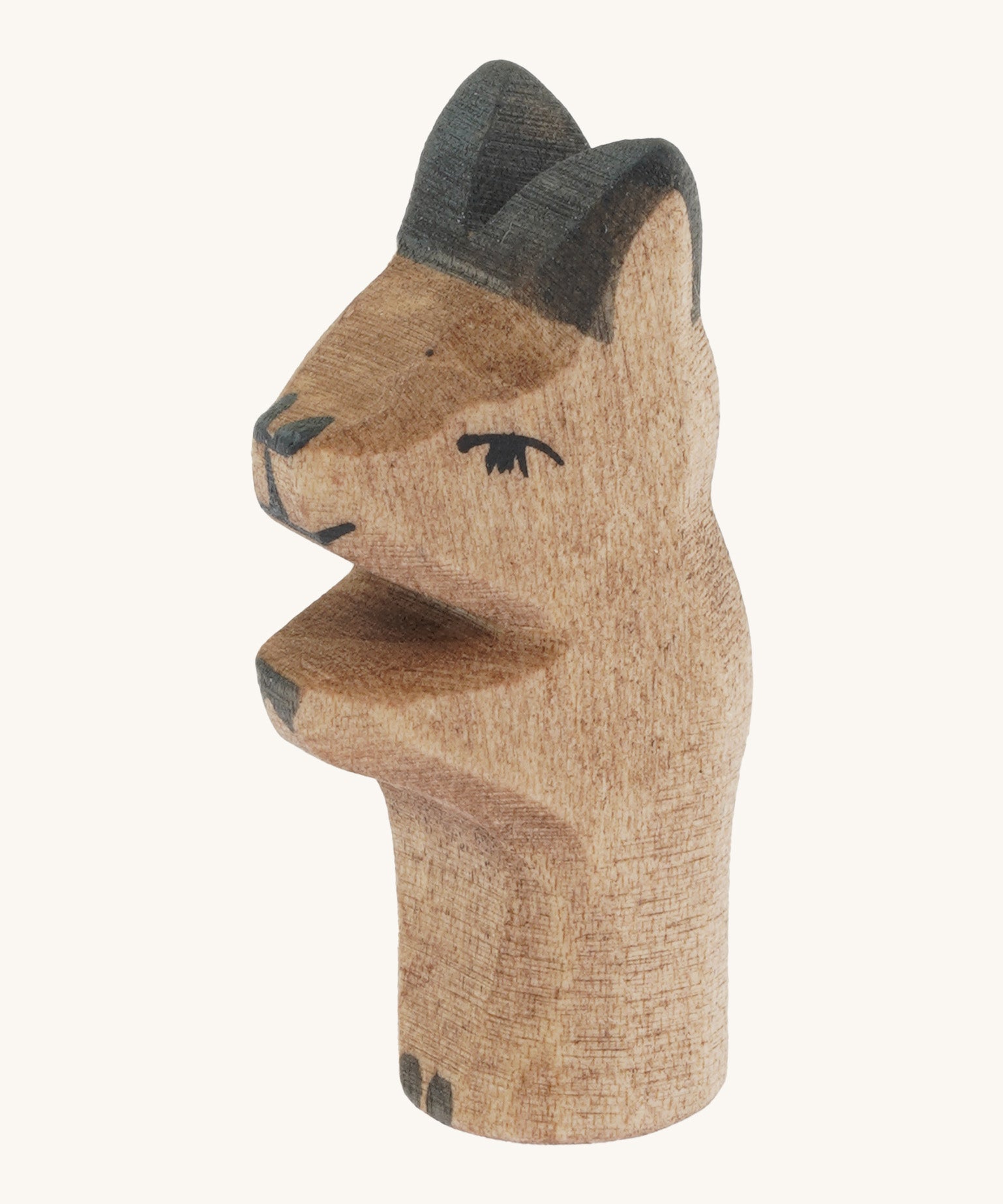 A close up of the Ostheimer wooden baby kangaroo figure showing it's head and body detail