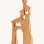 Ostheimer children's handmade wooden bell tower toy on a cream background