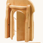 Ostheimer small world castle gate set with the doors open on a cream background