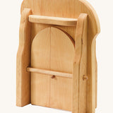 Ostheimer kids handmade wooden castle gate toy on a cream background