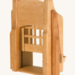 Ostheimer kids handmade wooden castle portcullis gate toy on a cream background
