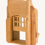 Ostheimer kids handmade wooden castle portcullis gate toy on a cream background
