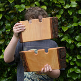 Two Ostheimer large wooden castle wall in a child's hands.