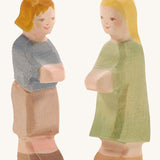 Ostheimer wooden Hansel and Gretel figures on a cream background.
