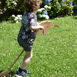 Child playing with the Ostheimer wooden hobby horse toy.