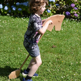 Child playing with the Ostheimer wooden hobby horse toy.