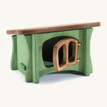 A wooden Ostheimer hut for chicken or geese on a cream background.