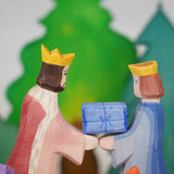 Ostheimer King and Qieen wooden toy figures, handmade in Germany, exchanging a small blue gift, Waldorf and small world play scene, sold at Babipur