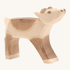 Ostheimer wooden reindeer calf on a cream background.