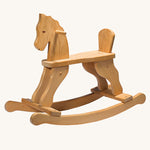 Ostheimer wooden rocking horse ride on toy on a plain background. 