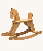 Ostheimer wooden rocking horse ride on toy on a plain background. 