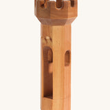 Ostheimer children's handmade wooden round tower toy on a cream background
