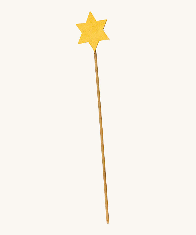 A wooden Ostheimer staff with a yellow star on the top for the Ostheimer angel on a cream background.