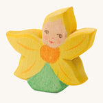 A wooden Ostheimer sunflower flower child figure on a cream background.