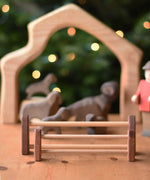 A large and small Ostheimer wooden toy fence placed together with the small fence placed in front of the large.  These wooden figures are part of a wide range of expertly hand crafted wooden toys here at Babipur. 