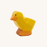 Ostheimer light coloured chick figure on a plain background. 