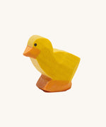 Ostheimer light coloured chick figure on a plain background. 