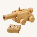 Ostheimer Small wooden Cannon toy With 5 cannon Balls on a plain background.