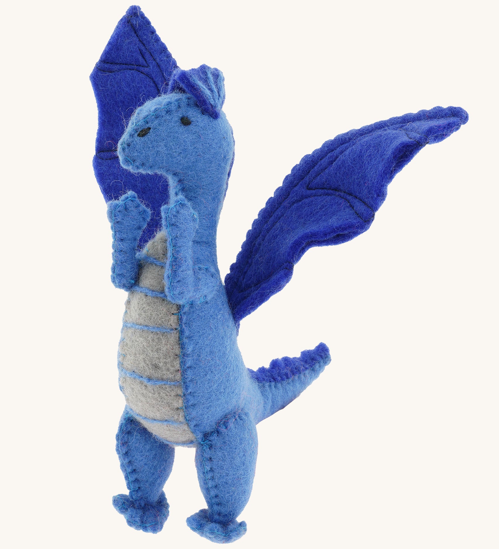 A close up of a Papoose blue soft natural coloured free felted natural dragon showing the stitching detail and facial features.