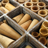 Close up of the 72 piece wooden tinker tray toy set from Papoose on a white background