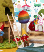 Papoose rainbow tree used in a small world play scene with other wooden and felted toys in the Babipur playroom.