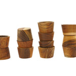 Papoose plastic-free stacking wooden bowls in 4 piles on a white background