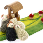 Papoose handmade sleepy mice toys huddled around a wooden wishing well on a green felt play mat