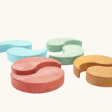 Papoose Toys wooden earth yim yams in blue, green, red and yellow