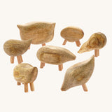 The Papoose Toys Mango Wood Pebble Animals Set on a plain background